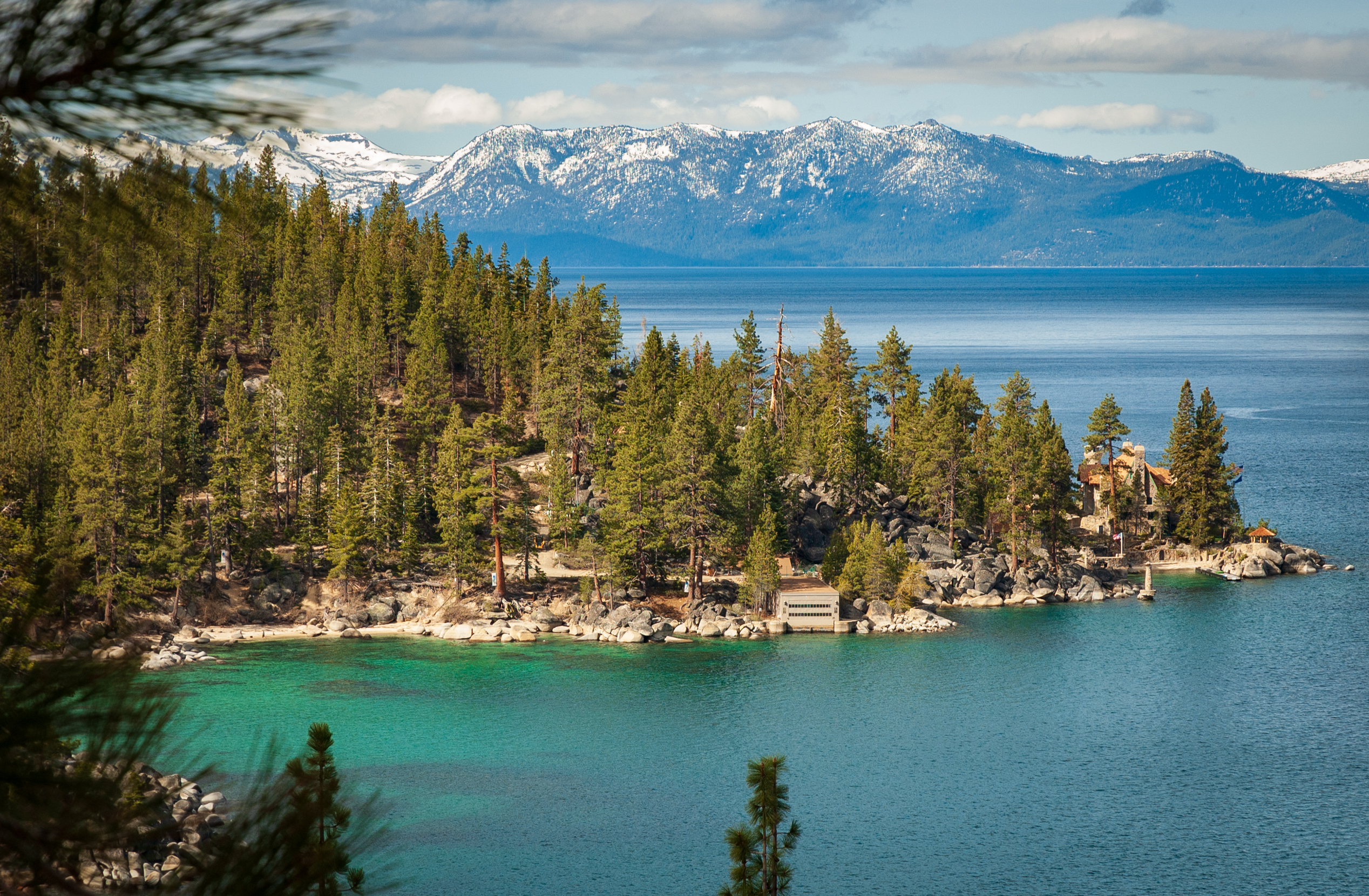 Lake Tahoe shoreline and snow-dusted Sierra Nevada mountains