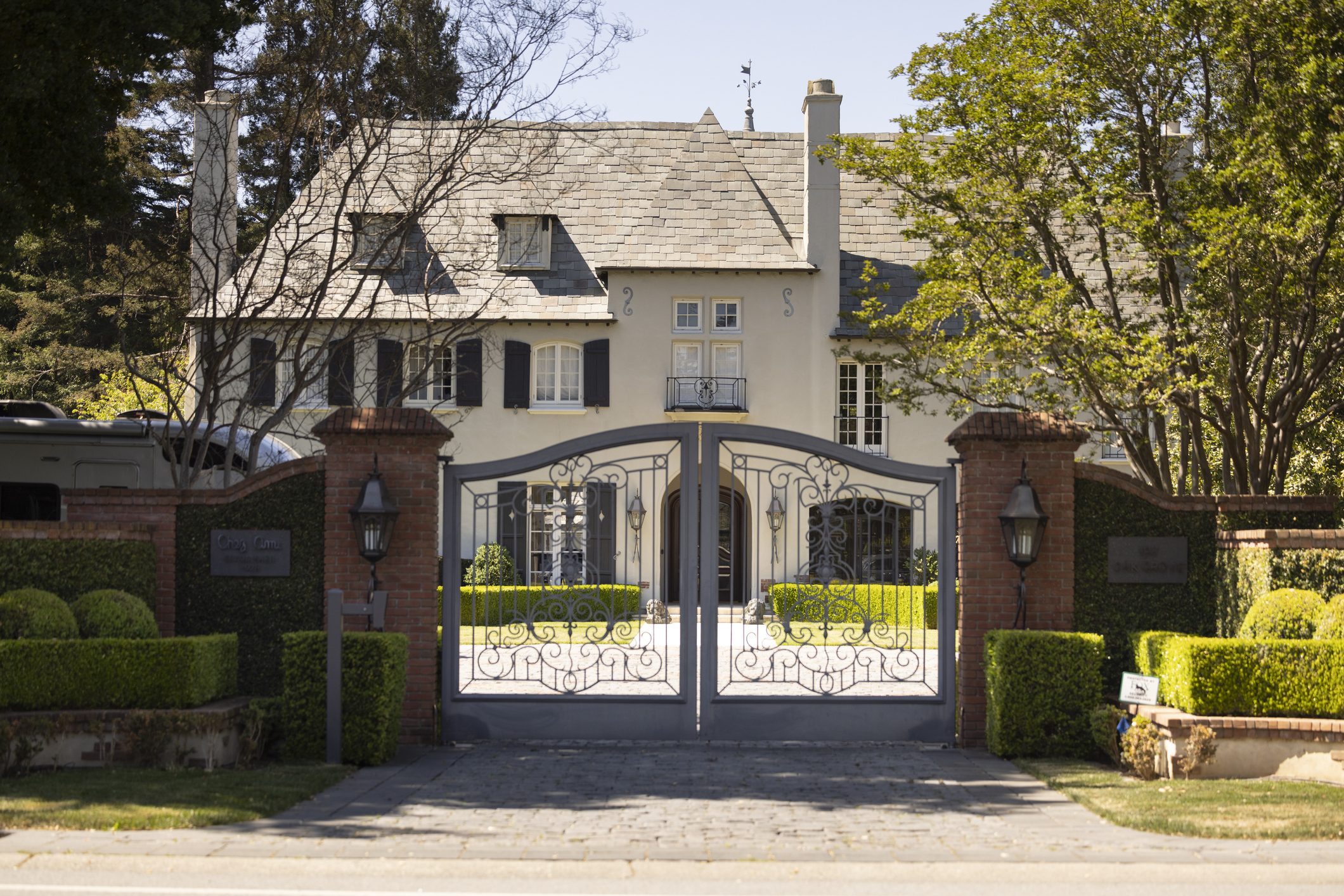 A gated Atherton home surrounded by trees