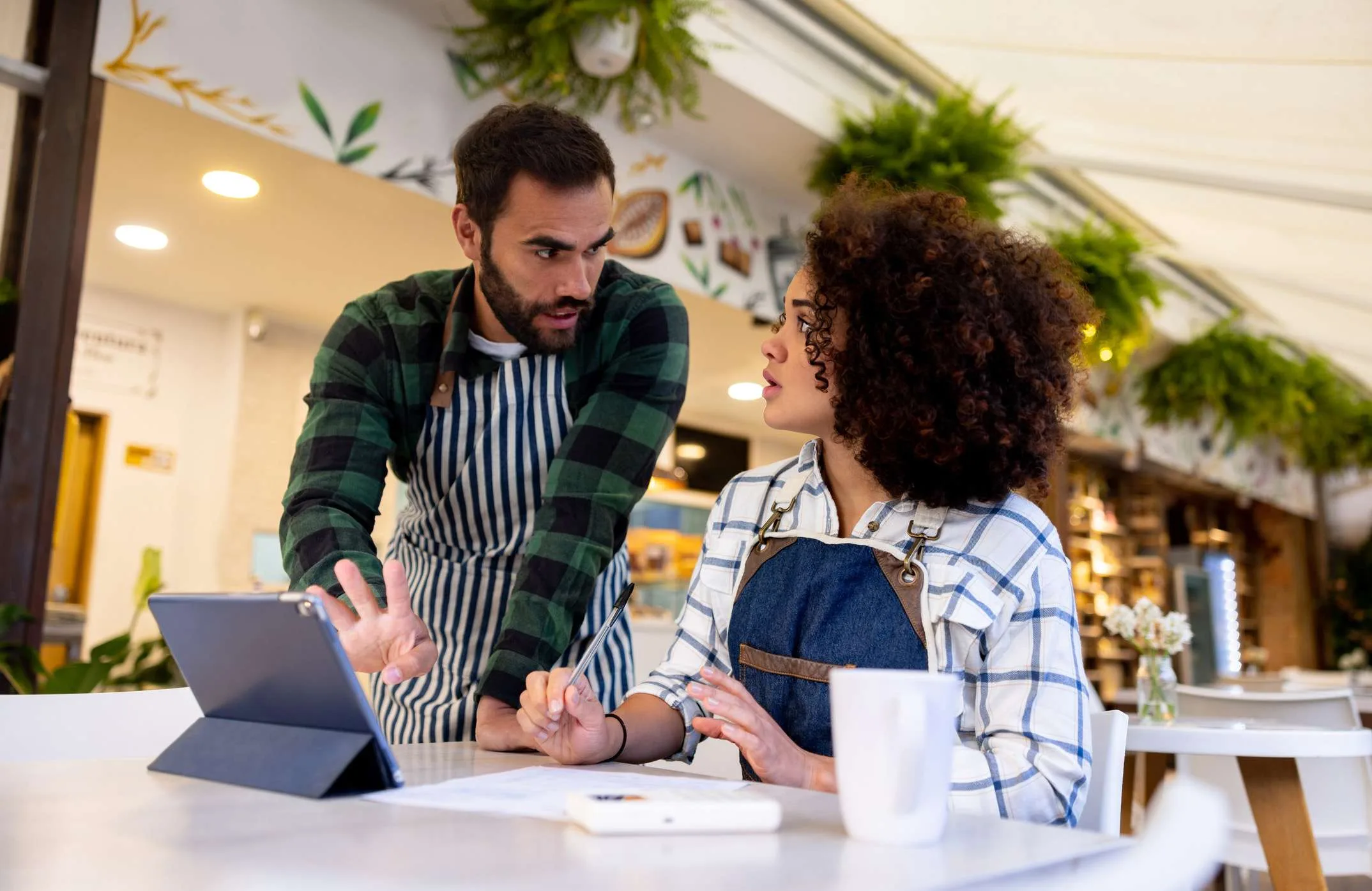 Self-employed buyers reviewing bank-statement loan options