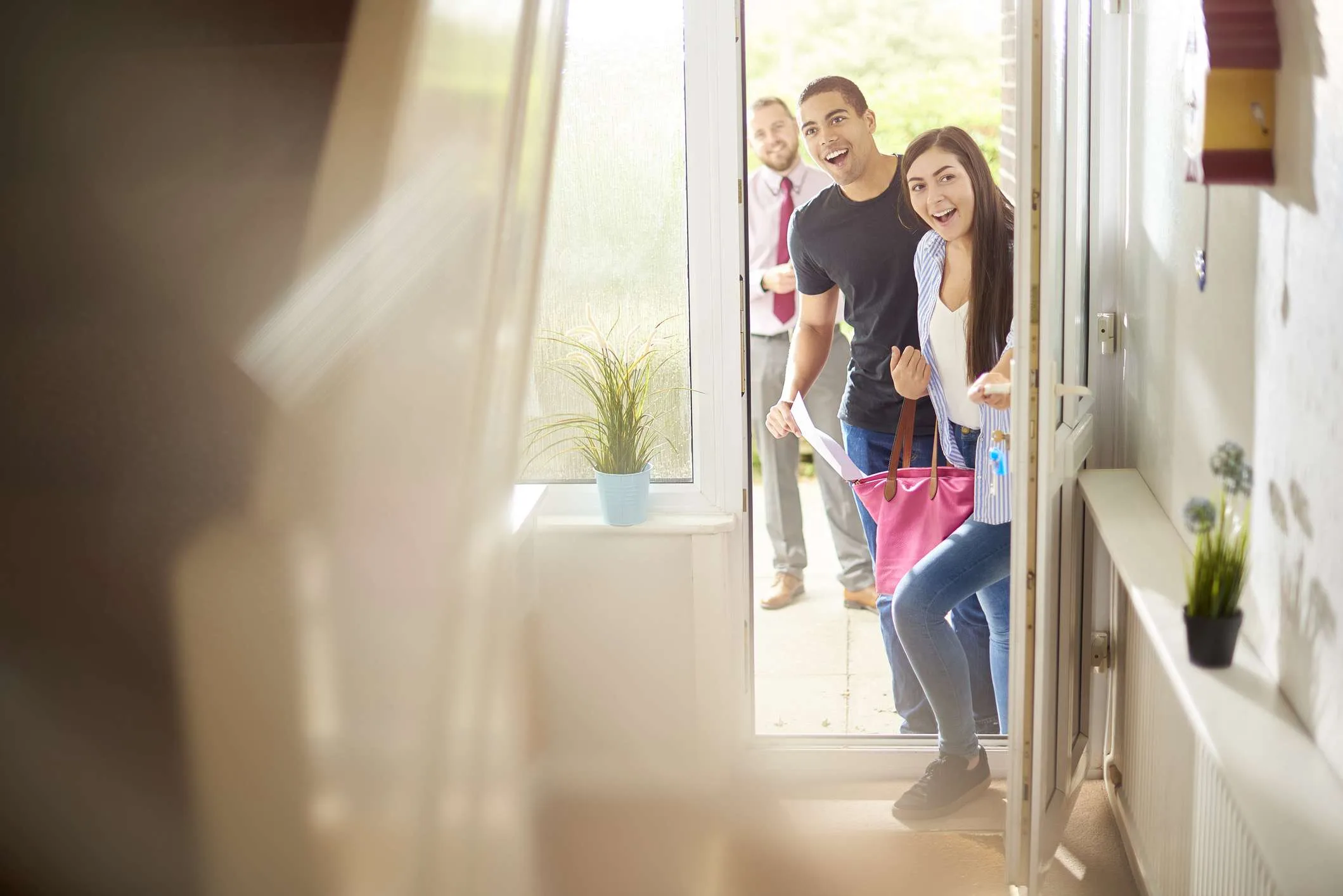 First-time home buyers walking into a California home